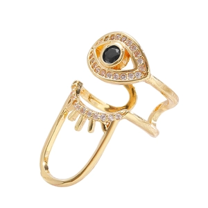 Adjustable gold plated evil eye nail ring with black center stone and zircon accents
