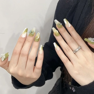 Glossy olive green gradient press-on nails with 3D crystal butterflies and rhinestones