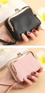 Litchi pattern leather card holders in black and pink with gold metal twist lock and wrist strap