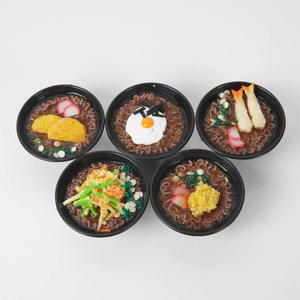 Set of five realistic miniature ramen bowl keychains with assorted tempura and egg toppings