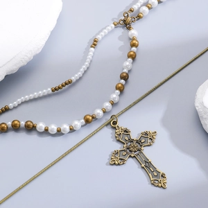 Vintage gold pearl cross necklace featuring double layered snake chain for women