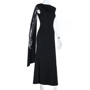 Detail of black slim-fit evening gown featuring a unique one-shoulder drape and open back