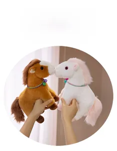 Close-up of soft plush horse toys with colorful bell collars and skin-friendly fabric