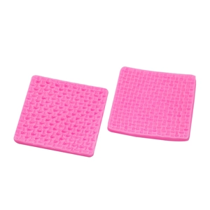 Pink silicone fondant mold with knit texture for sweater patterns on cakes