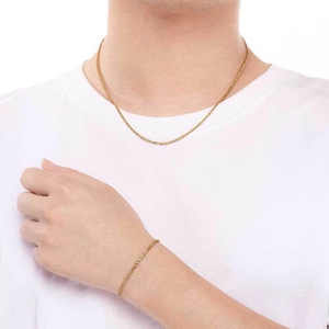 Ensemble collier et bracelet tendance en acier inoxydable doré à maillons torsadés