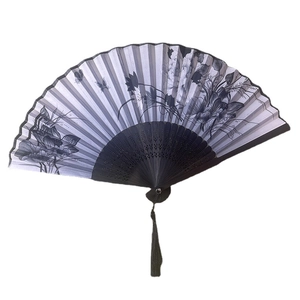 Traditional Chinese folding fan with ink lotus painting and black bamboo ribs