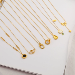 Elegant gold titanium steel necklace collection with heart, butterfly and roman motifs