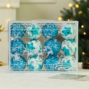 Detailed view of blue and white Christmas ornaments with sequins in a festive gift box