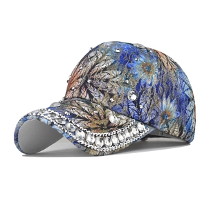 Detail of colorful baseball cap with rhinestone embellishments and metallic studs