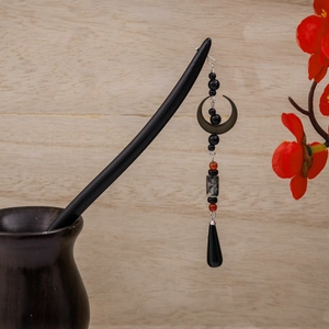 Traditional wood hair pin with black crescent moon pendant and red bead tassels
