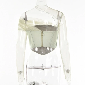 Dettaglio del top a fascia verde chiaro con manica in mesh e zip dorata sul retro