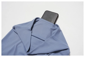 Detail of high waist yoga leggings with hidden pocket for smartphone storage