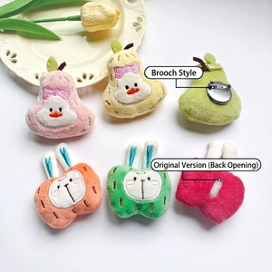 Cute fruit and animal plush brooches featuring apple rabbits and pear shapes for bags