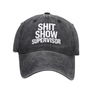 Washed black baseball cap with Shit Show Supervisor print in vintage cotton style