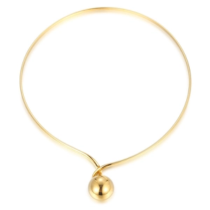 Minimalist gold stainless steel torque necklace with spherical charm on white background
