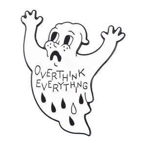 Detailed view of enamel ghost pin with Overthink Everything text on white background