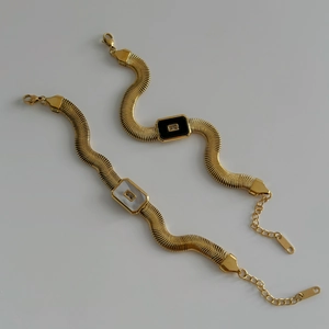 18k gold plated snake chain bracelets with black and white shell square pendants on white background