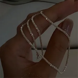 Delicate sparkling silver chain necklace with shimmering texture for women