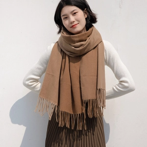 Elegant camel gradient cashmere scarf with classic fringe tassels and soft texture