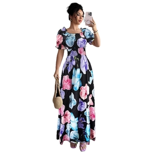 Floral print summer maxi dress with puff sleeves and cinched waist in black and multicolor