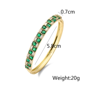 Detail view of gold-plated geometric bracelet showing 0.7cm width and 5.8cm inner diameter