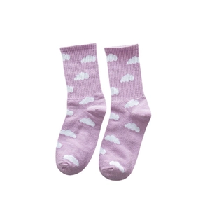 Lavender cotton crew socks featuring white cloud patterns in a cozy minimalist style