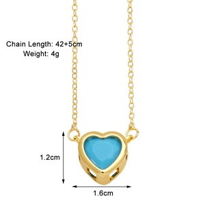 Detail view of heart pendant necklace with blue gemstone and dimensions marking