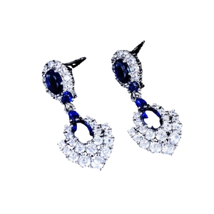 Elegant royal blue sapphire earrings with silver finish and teardrop design for women