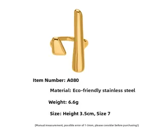Detailed view of golden minimalist vertical bar ring made from durable stainless steel