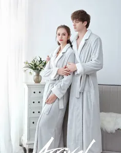 Detail of grey coral fleece bathrobe with thick white faux fur collar and waist tie