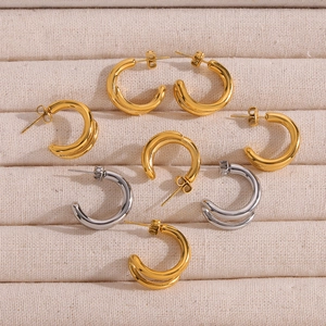 Minimalist double-layered geometric C-shaped hoop earrings in gold and silver finish