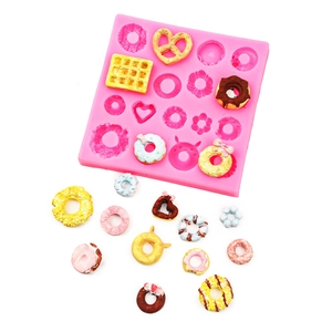 Mini silicone mold for candy, donuts, and waffles, with colorful clay dessert samples