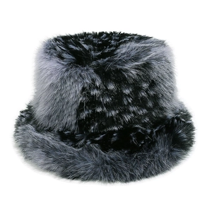 Macro detail of plush faux fur texture with grey and black gradient on winter bucket hat