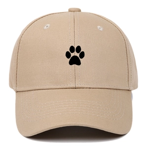 Detail of khaki cotton baseball cap featuring high-quality black cat paw embroidery