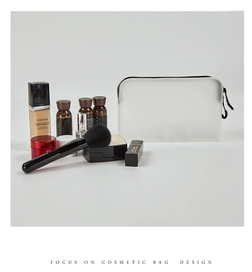 Translucent frosted makeup bag with black zipper showing large capacity and cosmetic items