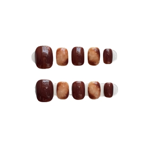 Short amber marble and dark reddish-brown press-on nail set with a high gloss finish