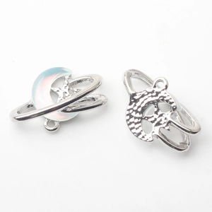 Detailed view of silver moon pendant with celestial resin inlay and textured reverse side