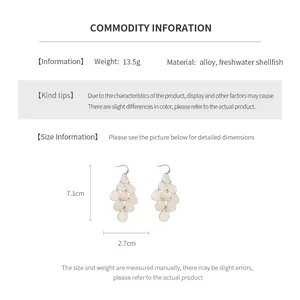 Detail specifications of teardrop shell tassel earrings showing weight, size and alloy material