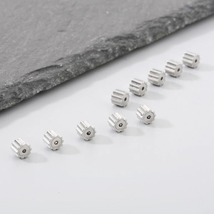 Set of 10 gear-shaped 304 stainless steel earring backings with a polished steel finish