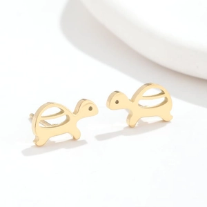 Minimalist cute sea turtle stud earrings in golden polished finish shown on white background