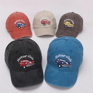 Flat lay view showing five colors of cotton baseball caps with vintage car embroidery detail