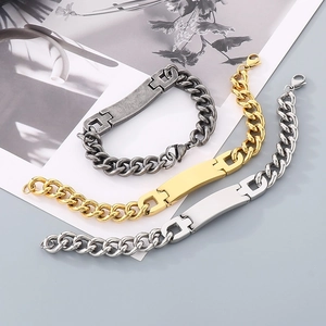 Macro view of stainless steel Cuban link bracelets in silver, gold, and vintage gray tones