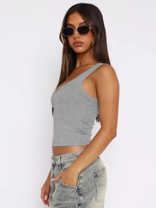 Close-up of grey ribbed knit texture and slim fit design on a cropped tank top