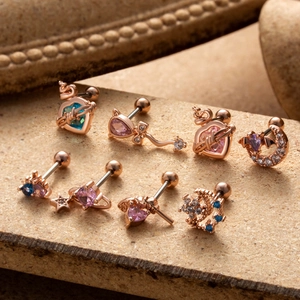 Set of 8 rose gold stainless steel cartilage studs with colorful zircon shapes