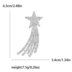 Star tassel brooch with rhinestones and silver metal base measuring 6.3cm in height