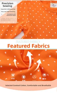 Detail of orange long sleeve girl dress with white polka dots and unicorn embroidery