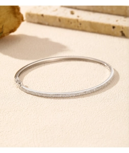 Detail of s925 silver bracelet featuring micro-paved cubic zirconia and a safety clasp