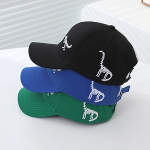 Three kids baseball caps in black, blue and green with white dinosaur bone embroidery