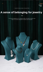 Set of five dark green velvet mannequin busts for professional necklace and jewelry display