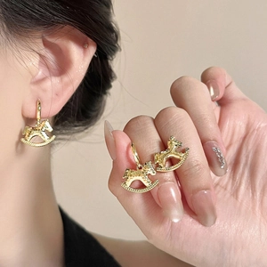 18k gold plated rocking horse earrings featuring a vintage minimalist horse pendant